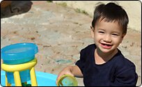 Boy playing on patio